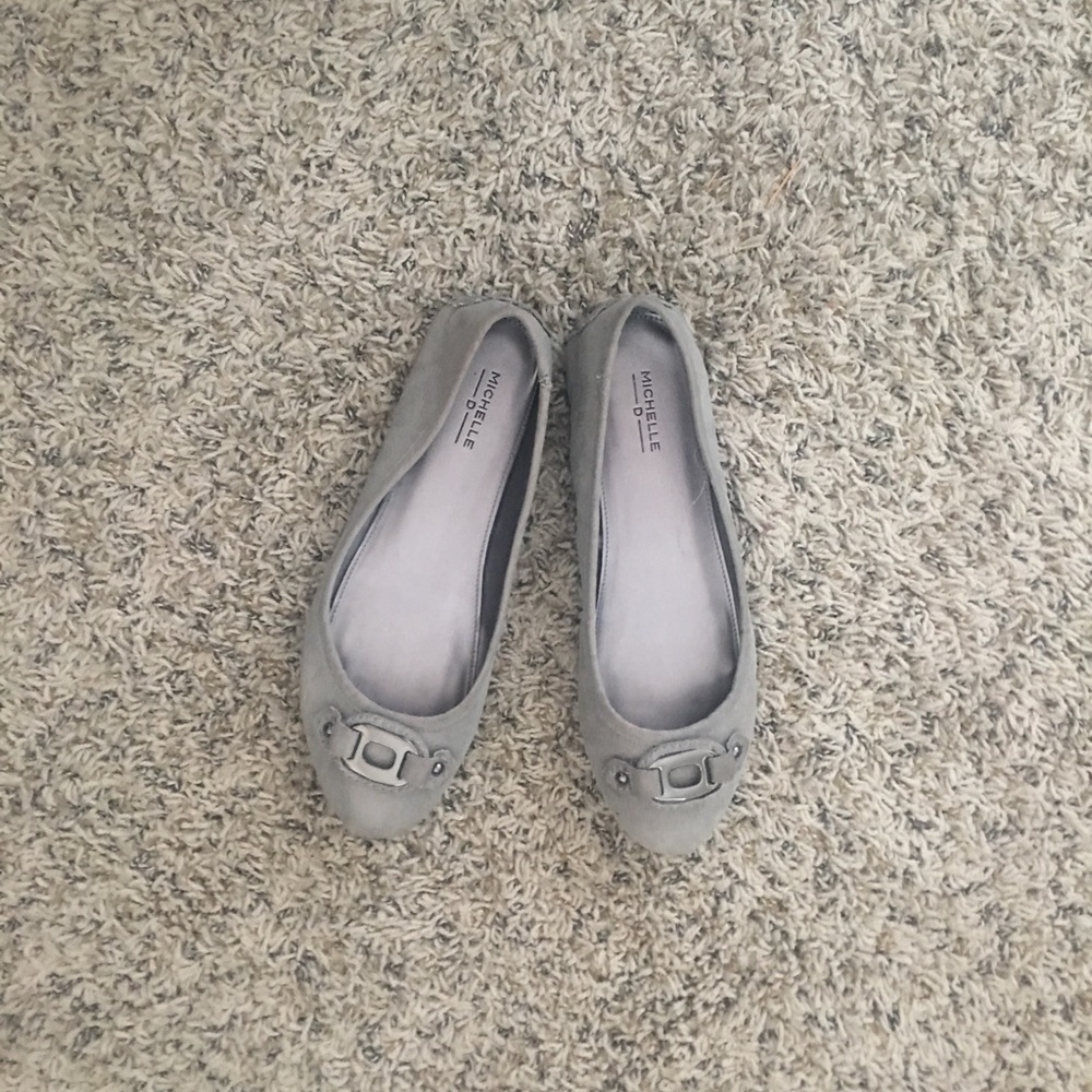 Grey flat loafers with buckle like embellishment